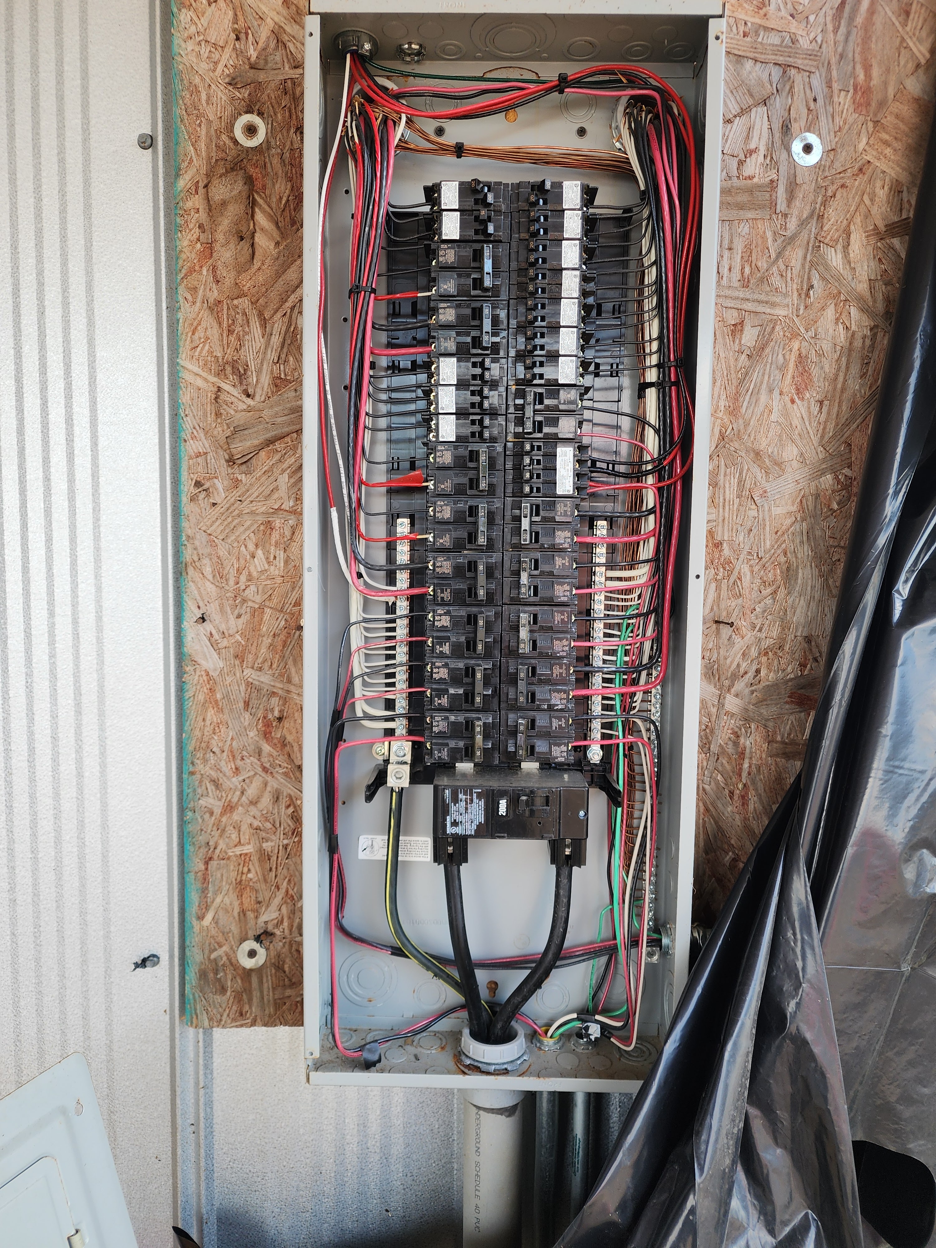 Interior of commercial electrical panel showing organized wiring